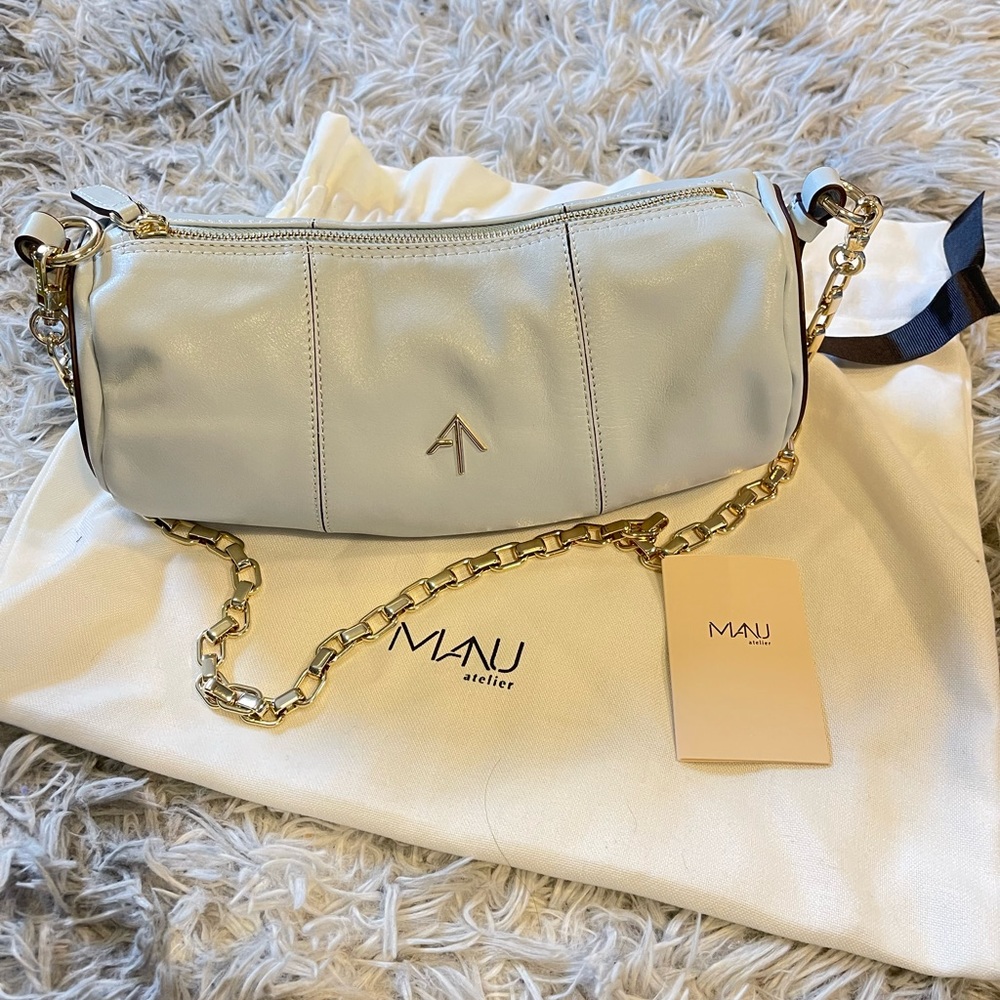 Blue manu atelier cylinder bag